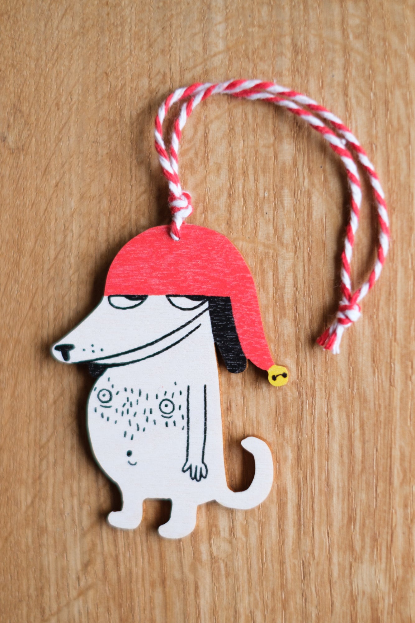 Sneaky Dog wooden christmas ornament